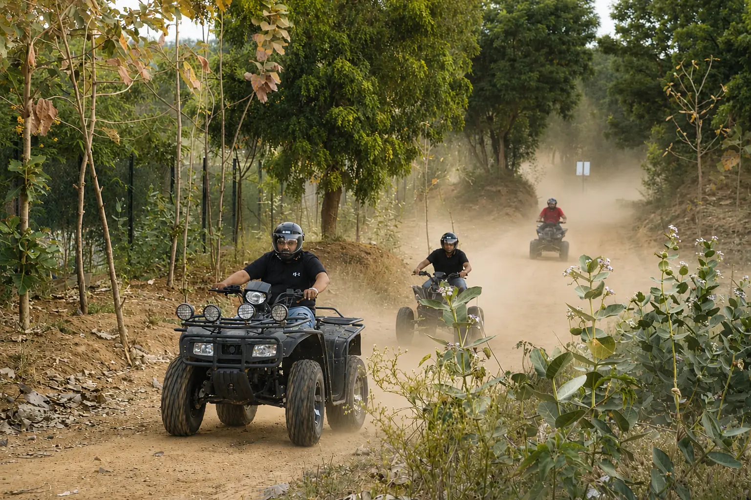 ATV riders on the forest trail
