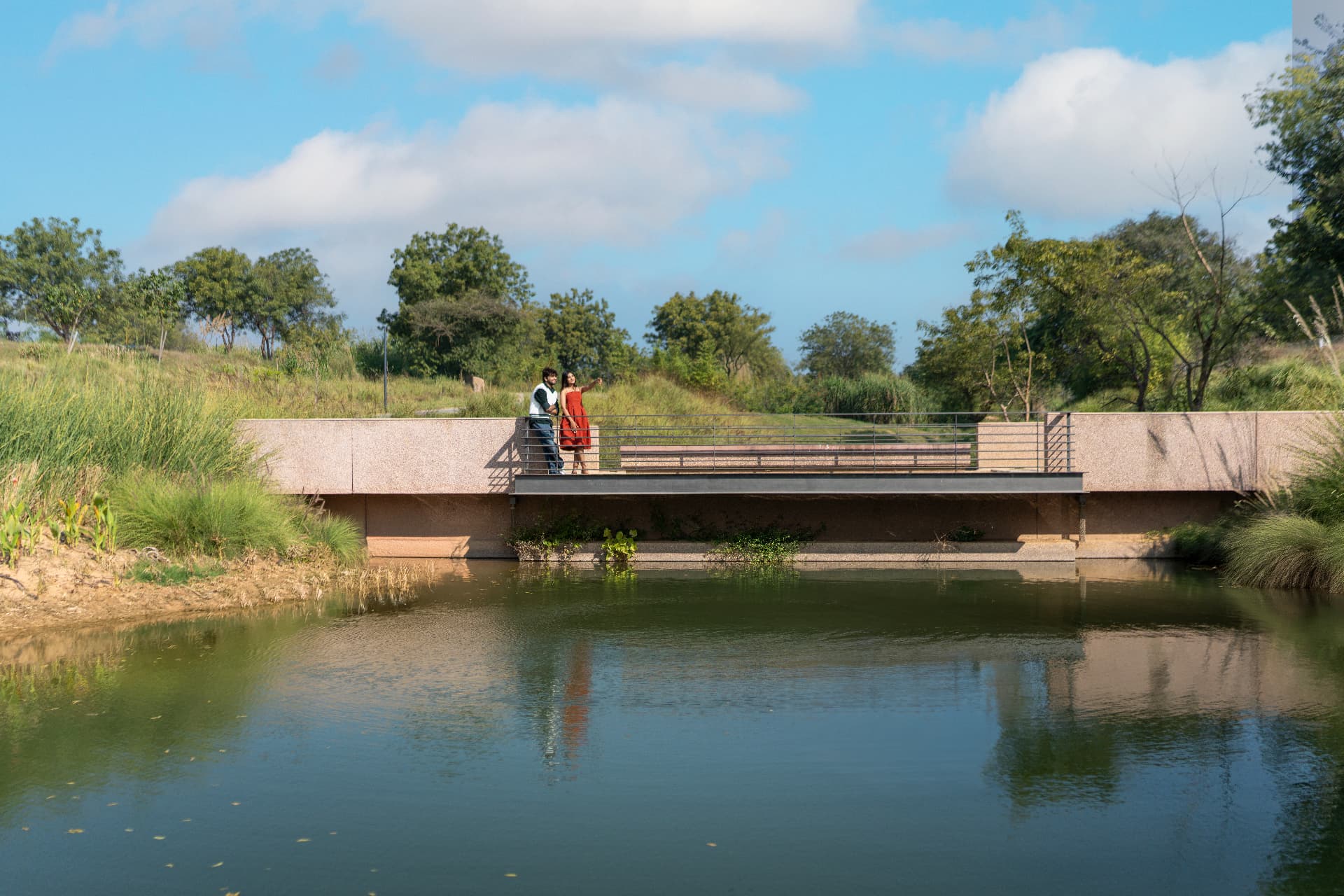 A couple on the lakeside bridge at Inverness
